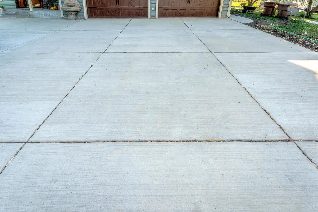 12900 Manning Trl N-After-Concrete Driveway 3.webp